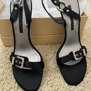 Never worn. Very sexy and glamorous sandals with rhinestones.  Leather sole